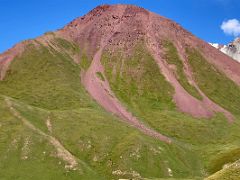 06B Bright red slope of ITMO University Peak in the late afternoon from Ak-Sai Travel Lenin Peak Base Camp 3600m